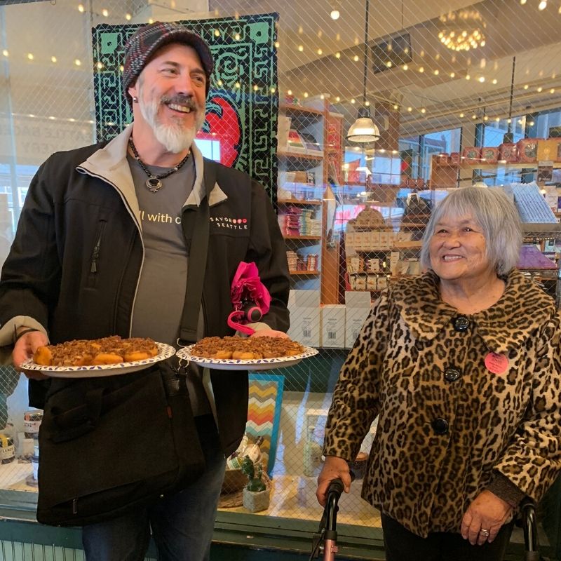 Sampling the maple bacon doughnuts on the Savor Seattle Food Tour | 4 Fun Things to Do in the Seattle Area